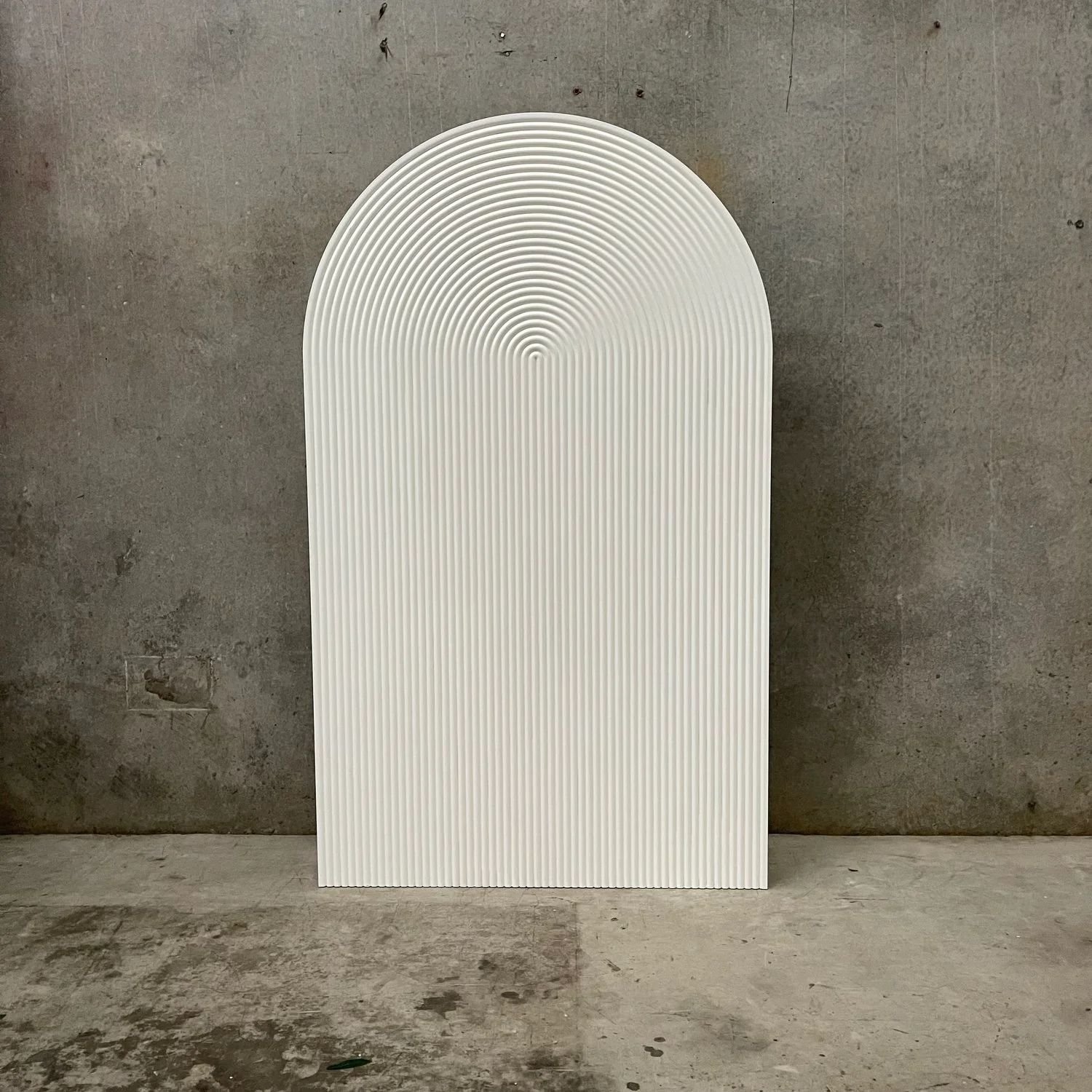 3 Fluted arch backdrop with vertical texture for luxury event styling