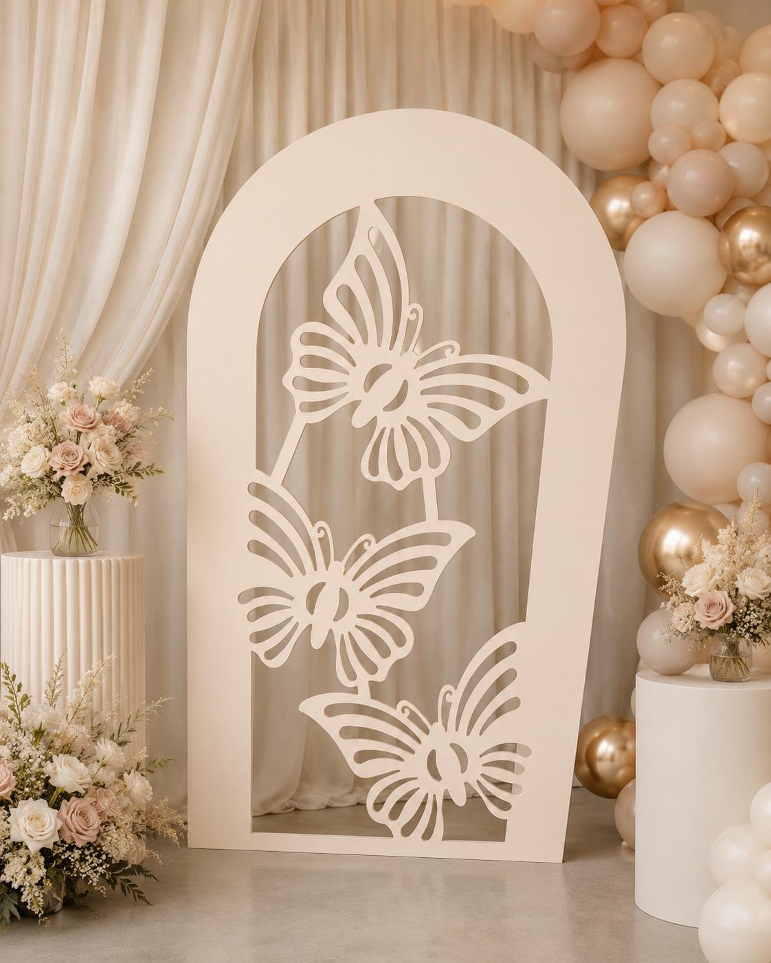 Butterfly arch backdrop panel styled for a Melbourne birthday party